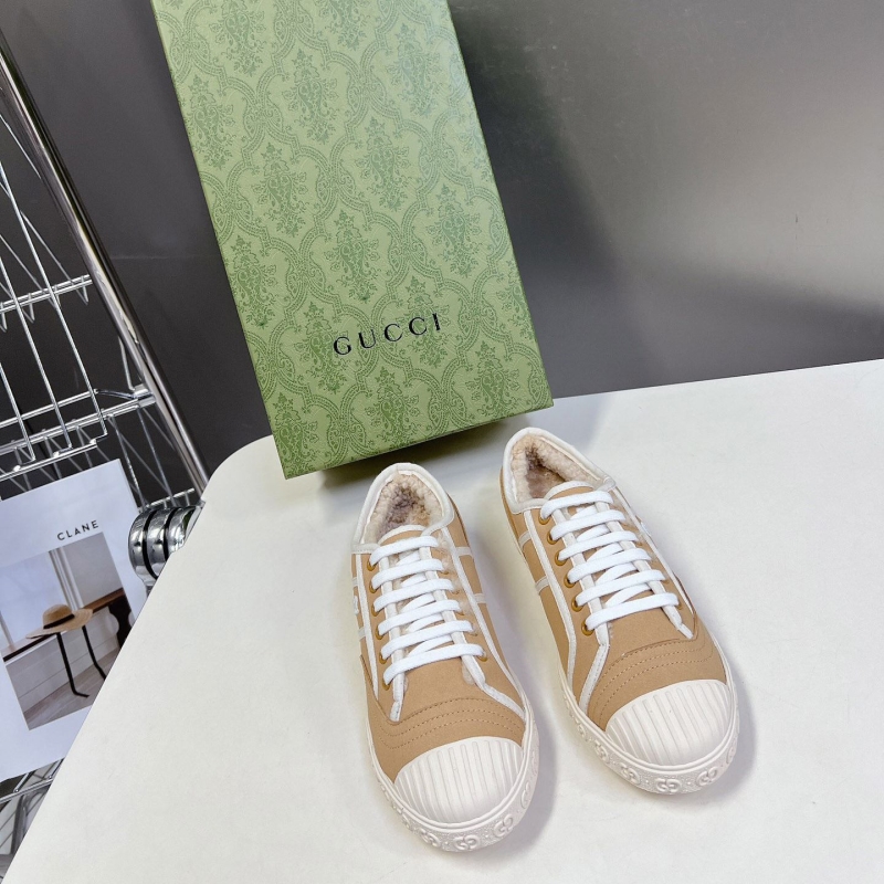 G*u*i sneakers